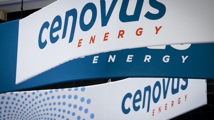 The name of the CENOVUS company is displayed on banners to the Global Energy Show in Calgary in June 2022.