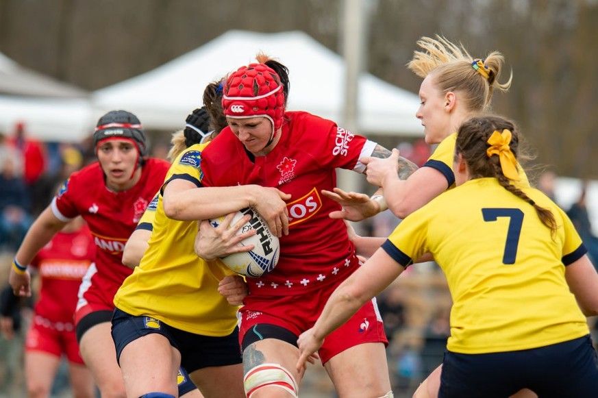 PLAN-LES-OUATES, SWITZERLAND - MARCH 12: #5 Judith Oriwal of Switzerland carries the ball during the Rugby Europe Women's Trophy match between Switzerland and Sweden at Centre sportif des Cherpin ...