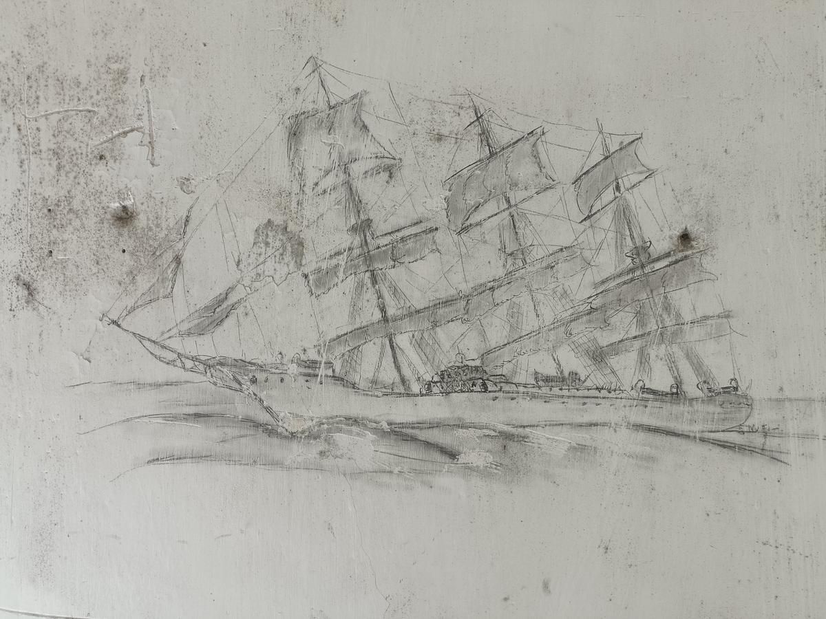 This ship engraving made in the stone was discovered in the attic of the hospital.