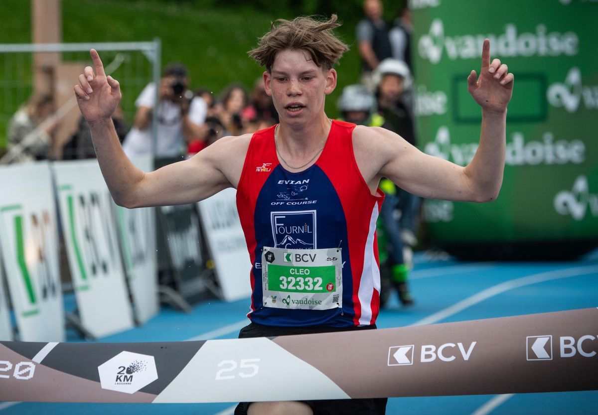 Cleo Nonne, the French runner, crossed the finish line in the winner during the boys' race 15/16 years old at the 20 kilometers of Lausanne. Photo by Jean-Guy Python. Cleo Nonne, the French runner, crossed the finish line in the winner during the boys' race 15/16 years old at the 20 kilometers of Lausanne. Photo by Jean-Guy Python.