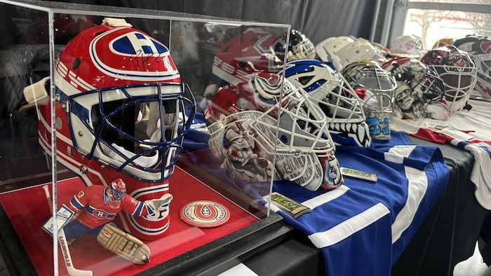 Goalkeeper helmets painted different color.