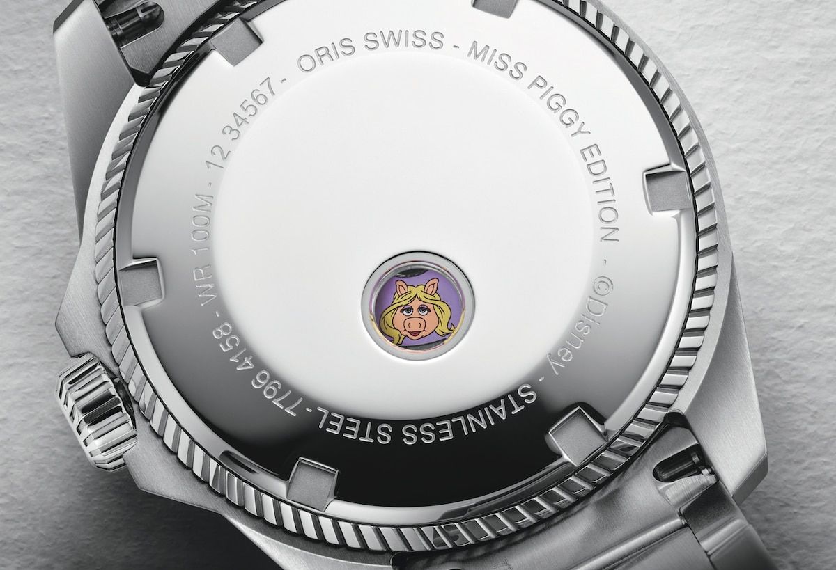 Miss Piggy's smile. He discovered on the back of the steel case, housed in a small window.