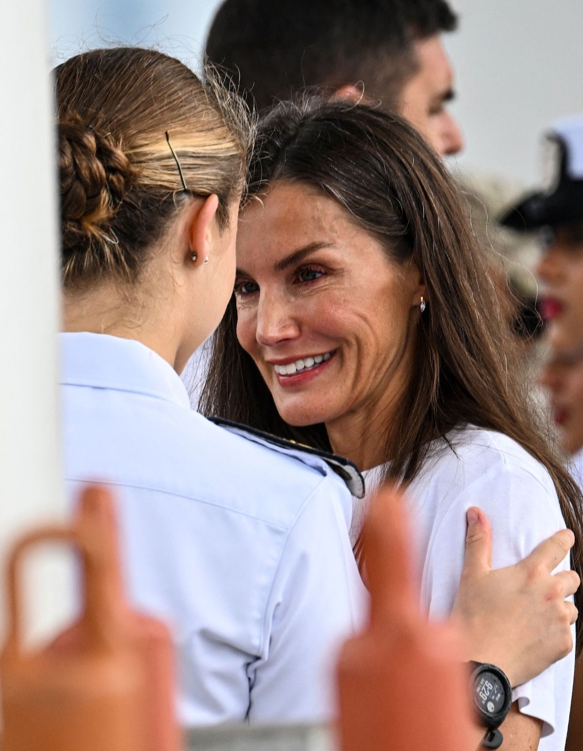 Spanish Crown Princess Leonor (L) is greeted by her mother Spain's Queen Letizia after disembarking from the Spanish Navy training ship Juan Sebastian de Elcano upon arrival at Amador Terminal Cruise in Panama City on May 3, 2025. (Photo by MARTIN BERNETTI / AFP)