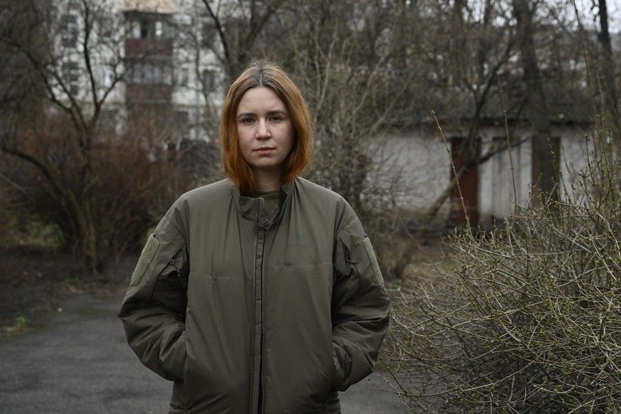 Kateryna Hauushka poses for a portrait in kyiv on March 12, 2025, at the time of the Russian invasion of Ukraine. Kateryna Hauushka is often sitting alone, eyes riveted on her phone, in ...