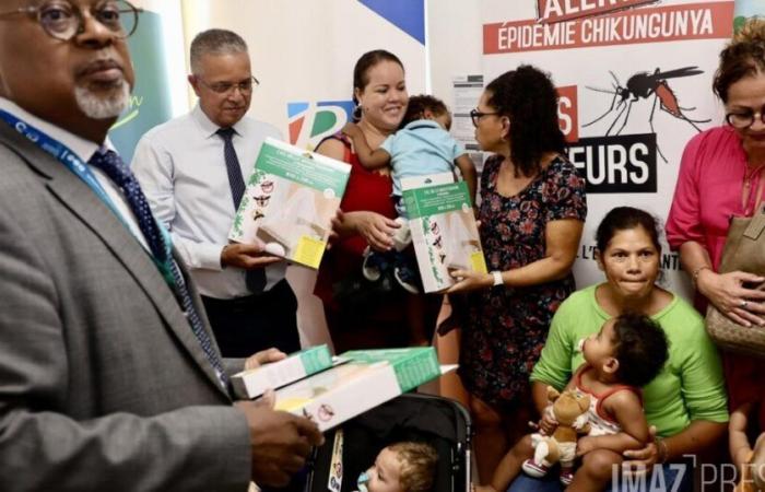 ARS and the department distribute mosquito nets to pregnant women and children