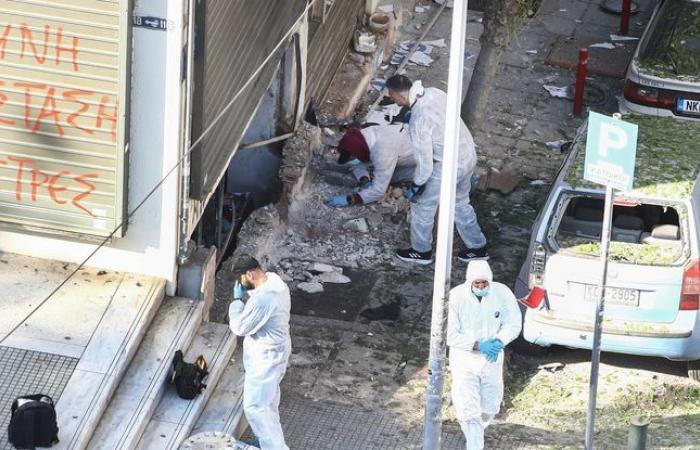 A woman dies after an explosion near a bank
